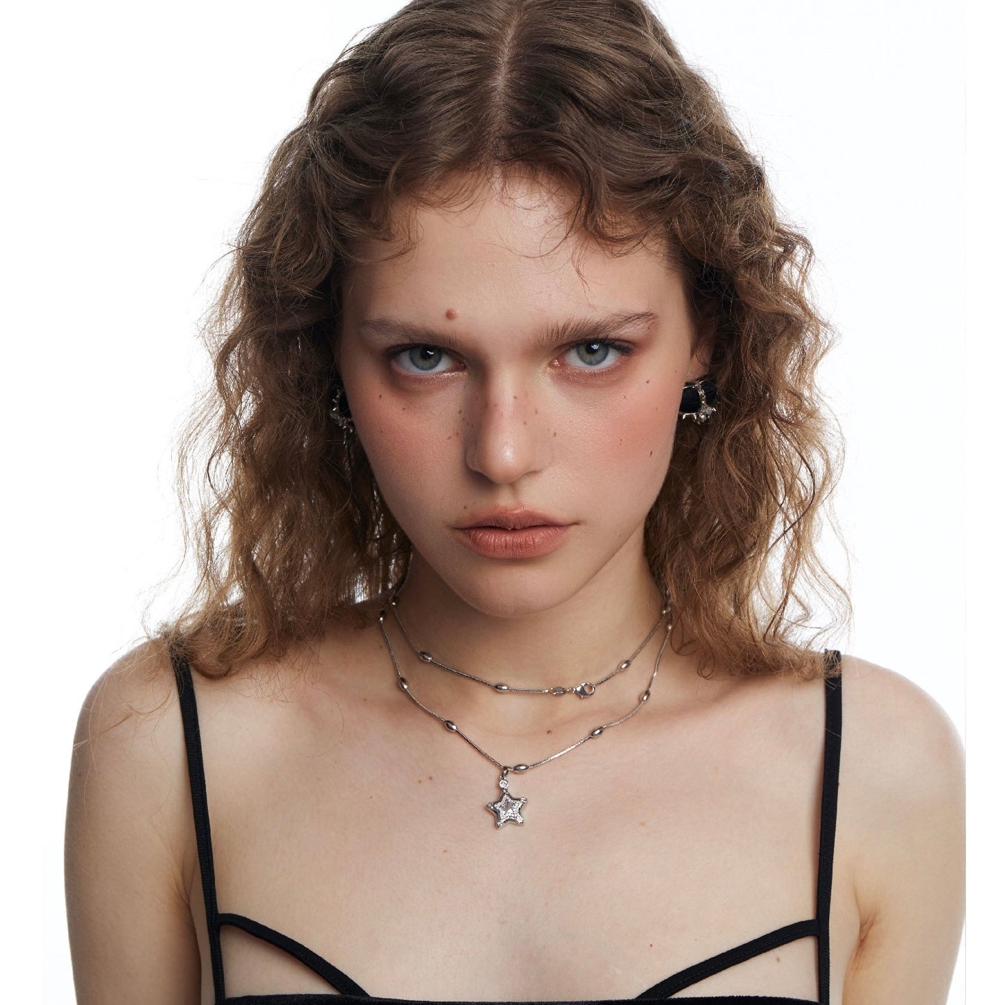 Collana a stella a doppio strato